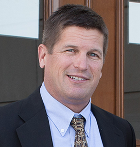 Mark Comstock, Esq.